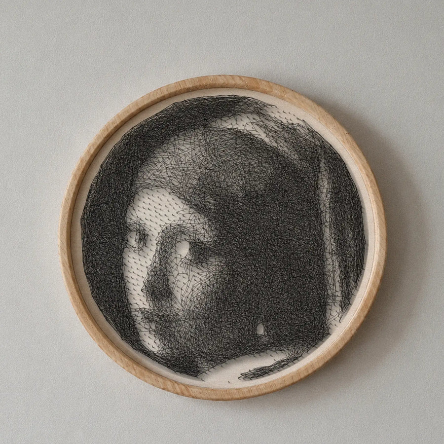 Girl with a Pearl Earring string art portrait featuring 2,235 nails and 8,117 thread connections on a 55 cm circular wooden board